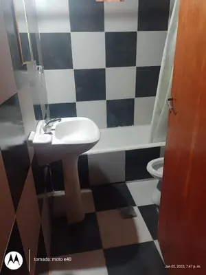 a bathroom with a sink and a toilet at El Descanso in Nono