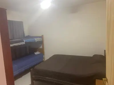a small room with a bed and a mirror at Depart in Embalse