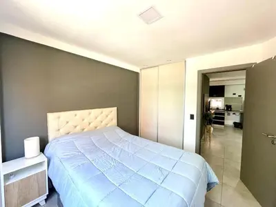 a bedroom with a large bed in a room at Nova Vita in Cordoba