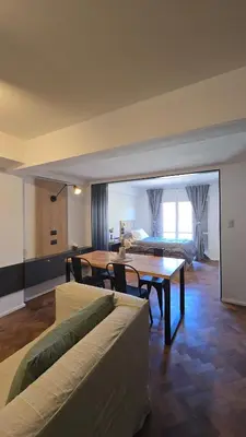 a living room with a couch and a table at ALV26 4G -Departamento Sobremonte in Cordoba