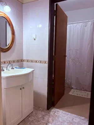 a bathroom with a sink and a shower at Casa de campo Marines in San Antonio de Arredondo