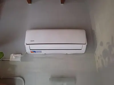 a printer sitting on a shelf in a refrigerator at No tiene nombre in Mina Clavero