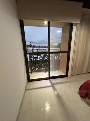 a room with a large window with a view of the ocean at Remanso in Alta Gracia
