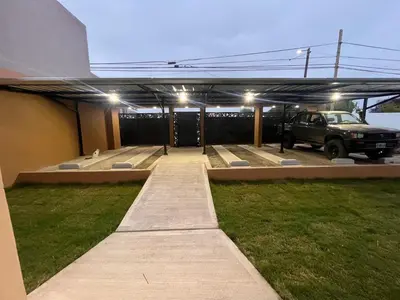a parking lot with a truck parked in it at Remanso in Alta Gracia