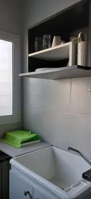 a kitchen with a sink and a green towel at Premium Berrotarán in Berrotarán