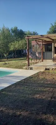a park with a pavilion and a playground at Lo de Nor - Refugio de Montaña in San Antonio de Arredondo