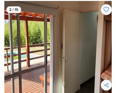 a room with a door open to a balcony at Cabaña Habibi in Potrero de Garay