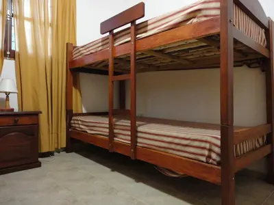 a couple of bunk beds in a room at Cabañas Costa Vergel in Los Reartes