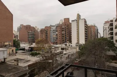 a view of a city with tall buildings at Nueva Córdoba Temporario in Cordoba