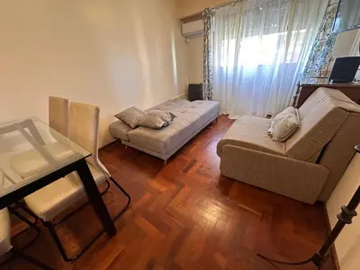 a living room with a couch and a chair at Boulevard Uno in Cordoba