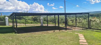 a metal pavilion with a view of a field at Las liebres in San Lorenzo