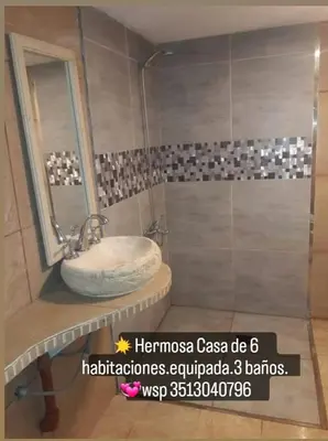 a bathroom with a sink and a mirror at Lucerito no reserve x aca in Villa Santa Cruz del Lago