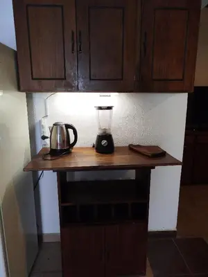 a kitchen counter with a blender on top of it at DepartamentoVCP in Villa Carlos Paz