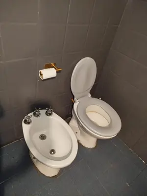 a bathroom with a toilet and a sink at DepartamentoVCP in Villa Carlos Paz