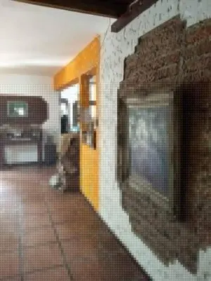 a room with a brick wall and a brick floor at maemm el castillto in Mina Clavero