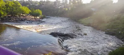 a view of a river from a bridge at Fermina in Villa Icho Cruz