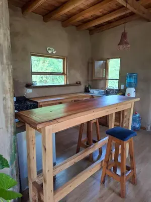 a kitchen with a wooden counter top in a room at Espaz in Las Calles