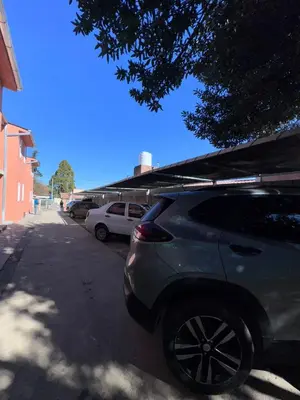 a car parked on the side of a street at Dúplex Juncal in Villa Carlos Paz