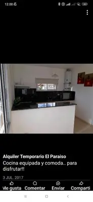 a picture of a kitchen with a counter top at El Paraiso in Villa Carlos Paz