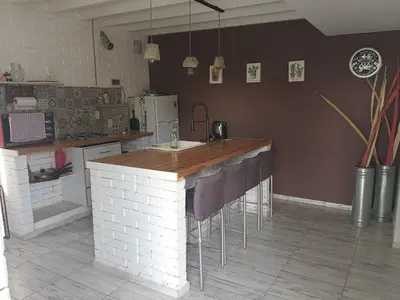 a kitchen with a counter top in a room at Virdi ca fui in Cordoba