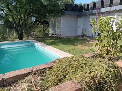 a swimming pool in the yard of a house at Virdi ca fui in Cordoba