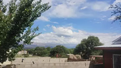 a view of the mountains from the roof of a house at Las Lomitas 2 in Villa Cura Brochero