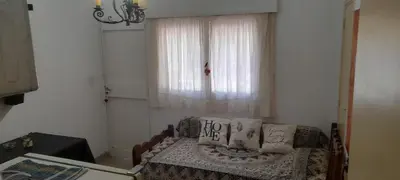 a living room with a couch and a window at Victoria in Villa Icho Cruz