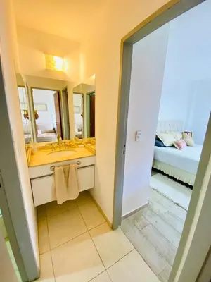 a bathroom with a sink and a mirror at Dpto Gral paz Tranquilo y comodo in Cordoba