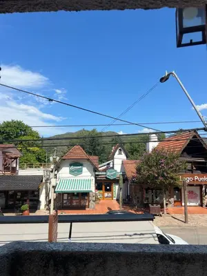 a view from a bus of a town with buildings at Posada Novalis in Villa General Belgrano