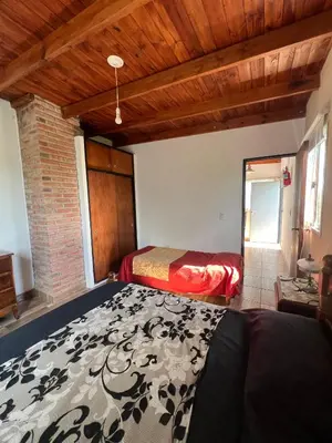 a bedroom with two beds in a room at Cobiche in Villa Larca