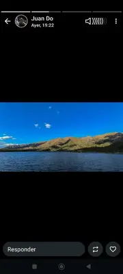 a computer screen with a picture of a lake at Pasos del Dique in Cortaderas