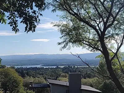 a view from the top of a hill with a tree at Chalet Noemí in Villa Ciudad de America