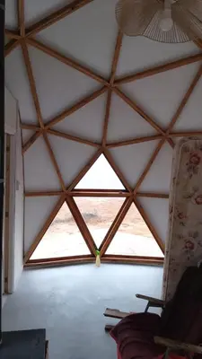 a room with a large window in a roof at Domo Bike in Villa Ciudad de America