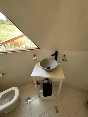 a bathroom with a sink and a toilet at Domo Bike in Villa Ciudad de America