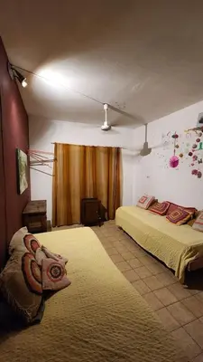 a bedroom with a bed in a room at Casa Céntrica a 4c del rio de 2 Dormitorios para 5 in Villa Carlos Paz