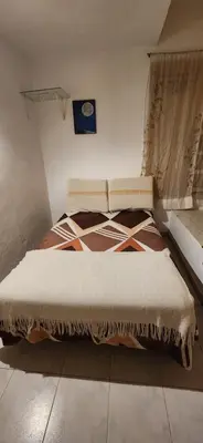 a bedroom with a bed in a room at Casa Céntrica a 4c del rio de 2 Dormitorios para 5 in Villa Carlos Paz