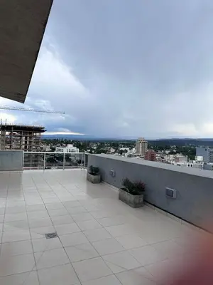 a balcony with a view of a city at Depto centro in Villa Carlos Paz