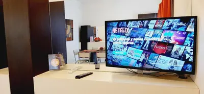 a flat screen tv sitting on top of a table at Torre Myng in Villa Carlos Paz