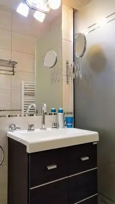 a bathroom with a sink and a mirror at Torre Myng in Villa Carlos Paz