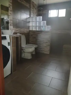 a bathroom with a toilet and a sink at Torre Fuerte in Cerro de Oro