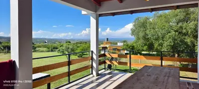 a balcony with a view of a field at DUPLEX Stadium in Tanti