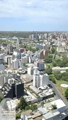 an aerial view of a city with tall buildings at The Thirty Floor Sky Suite in Cordoba