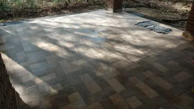 a concrete patio with a shadow of a tree on it at Casa en balneario Mayu Sumaj en cercanias de Villa Carlos Paz in San Antonio de Arredondo