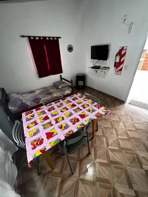 a table with a table cloth on it in a room at Faroflor departamento in Arroyo de Los Patos