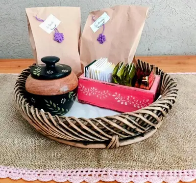 a basket filled with books and a box of books at La Berilde in La Población