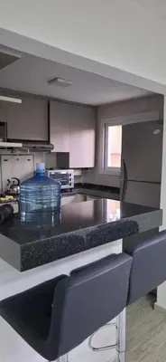 a kitchen with a counter top with a bowl on it at Alojamiento de lujo , duplex - departamento in Villa Carlos Paz