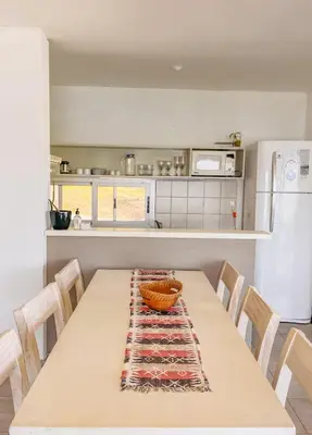 a kitchen with a table with a bowl on it at PUEBLO CHICO - casas de lago in Villa Ciudad de America