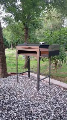 a piano sitting in a park next to a tree at Casita Salvia in Arroyo de Los Patos