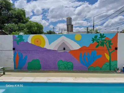 a mural on the side of a wall at JM brochero in Villa Cura Brochero