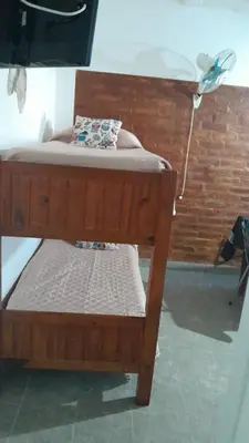 a bedroom with a bunk bed and a bed at JM brochero in Villa Cura Brochero